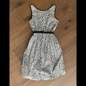 Maggy London “bubble” hem black and white dress with POCKETS